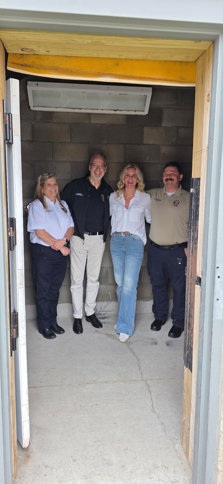 Team at training center doorway
